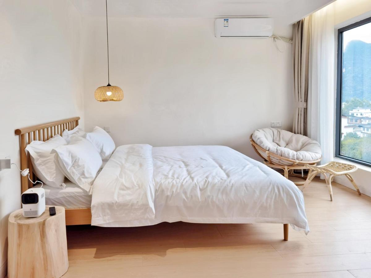 יאנג שואו Riverside Retreat Hotel מראה חיצוני תמונה